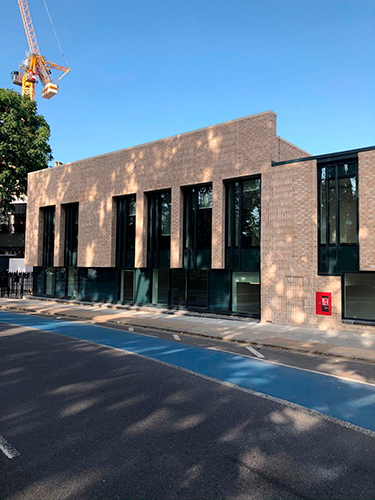 Part modular school with brick façade